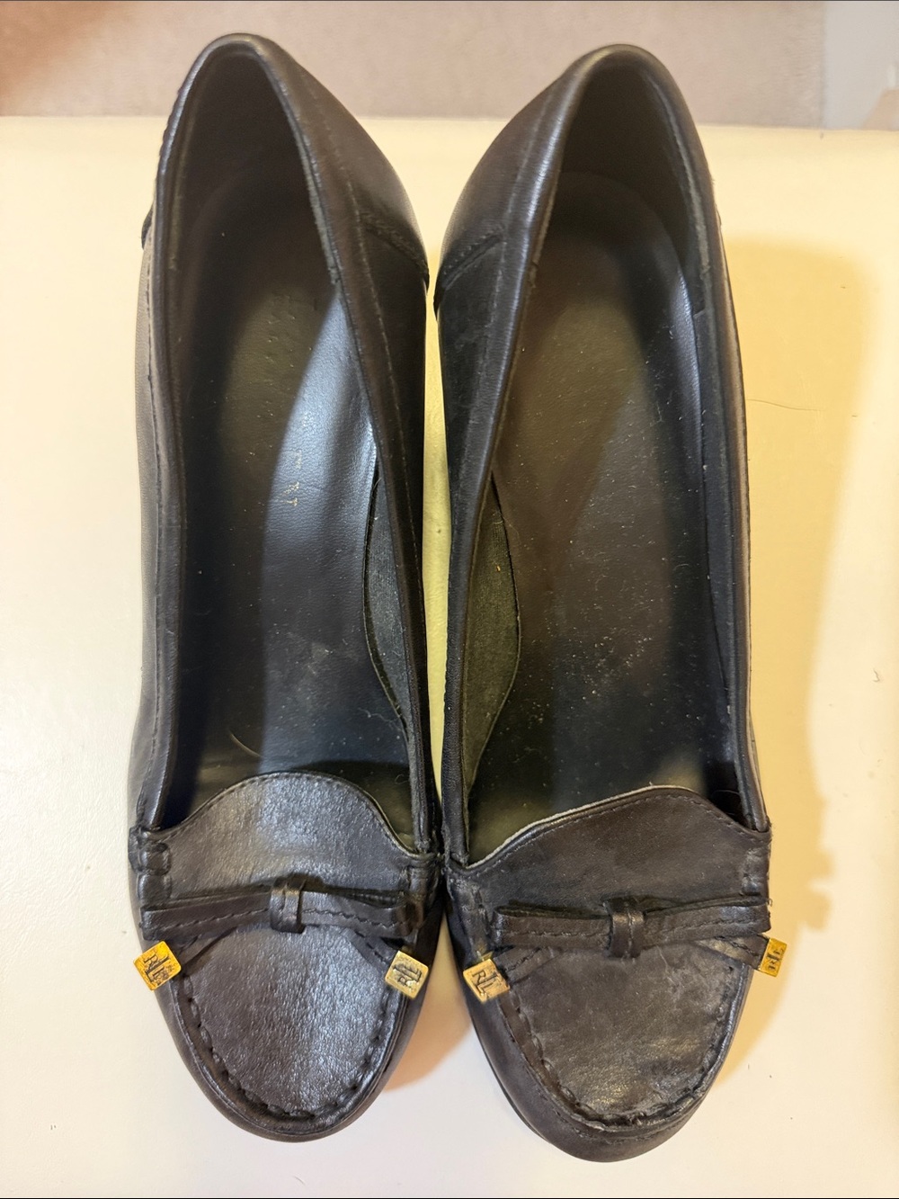 Black Leather Penny Loafers with Gold Accents